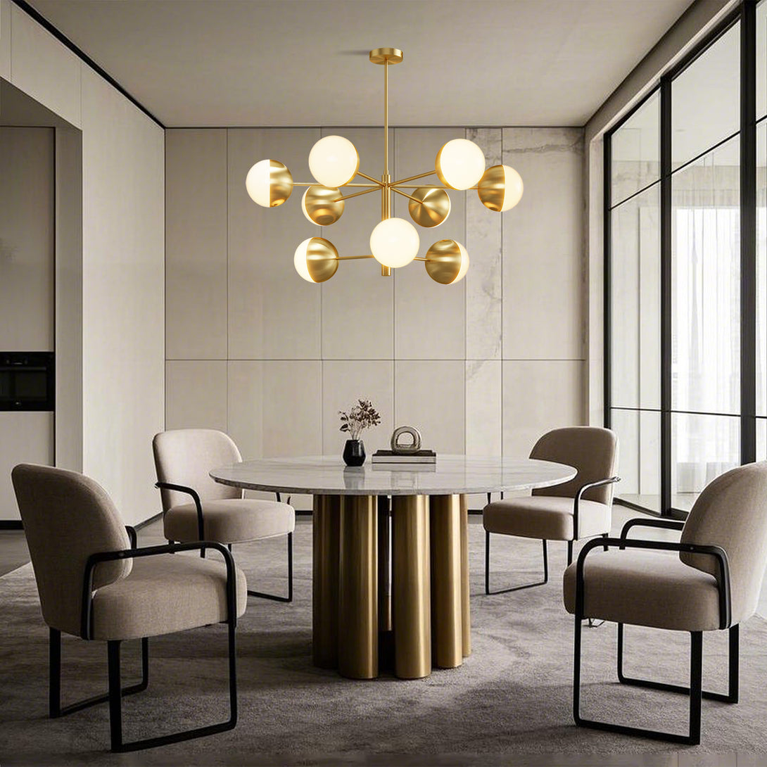 Frosted globe chandelier above a round dark dining table beside tall windows